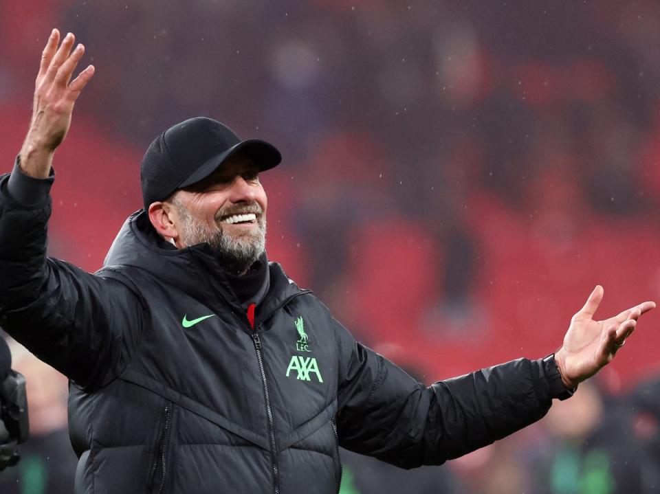 Jurgen Klopp celebrates winning the Carabao Cup (EPA)