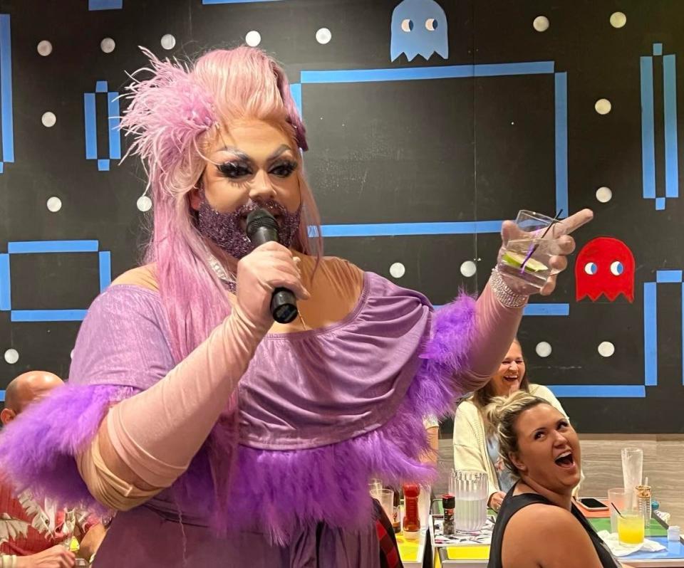 Drag queen Peach Fuzz entertains the crowd at a recent drag bingo night at That Pop Up Bar, which uses the space of Twisted Citrus restaurant in North Canton on select dates. Bingo prizes include candles, beach towels, purses and wine glasses.