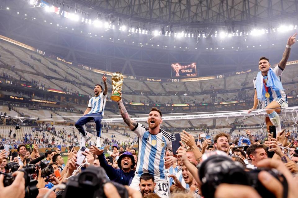 Dec 18, 2022; Lusail, Qatar; Argentina forward Lionel Messi (10) celebrates with fans after winning the 2022 World Cup final against France at Lusail Stadium.