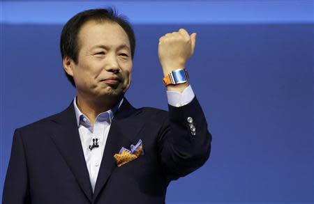 Shin Jong-kyun, President and CEO, head of IT and Mobile Communication division of Samsung presents the Samsung Galaxy Gear smartwatch during its launch at the 'Samsung UNPACKED 2013 Episode 2' at the IFA consumer electronics fair in Berlin, September 4, 2013. REUTERS/Tobias Schwarz