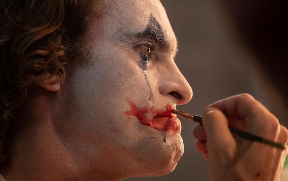 Joaquin Phoenix puts on the makeup in 