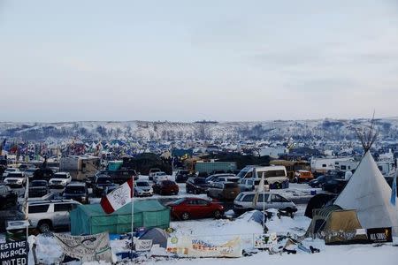 Vehicles and campsites fill the Oceti Sakowin camp as "water protectors" continue to demonstrate against plans to pass the Dakota Access pipeline near the Standing Rock Indian Reservation, near Cannon Ball, North Dakota, U.S., December 3, 2016. REUTERS/Lucas Jackson