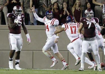 Bo Wallace (14) and Mississippi continue to roll through the SEC, beating Texas A&M on the road Saturday. (AP)