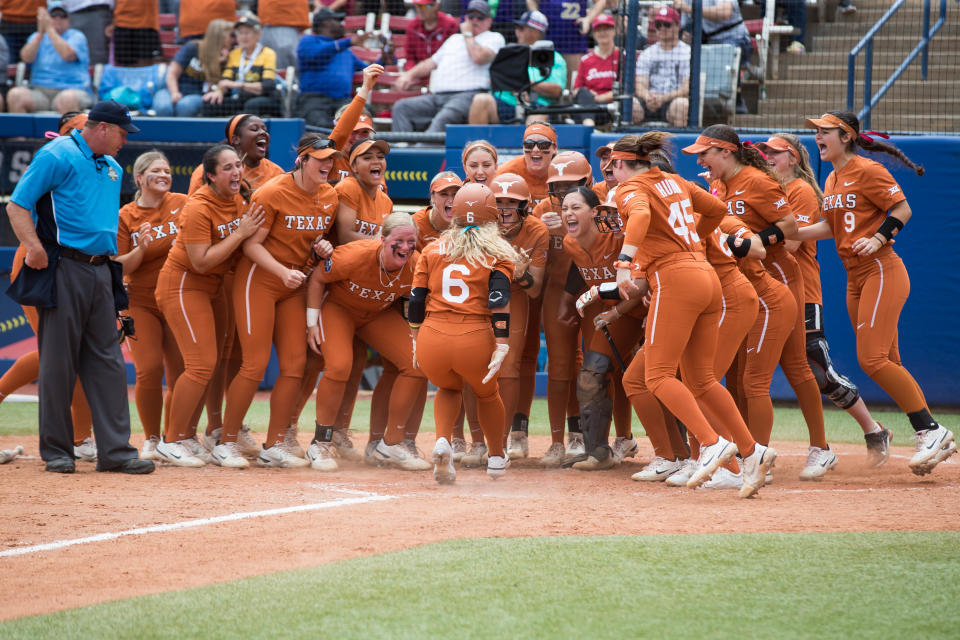 Jun 2, 2022; Oklahoma City, Oklahoma, USA; The Texas Longhorns team greats outfielder Isabella Dayton (6) after her two run home run during the sixth inning of the NCAA Women's College World Series game against the UCLA Bruins at USA Softball Hall of Fame Stadium. Texas won 7-2. Mandatory Credit: Brett Rojo-USA TODAY Sports