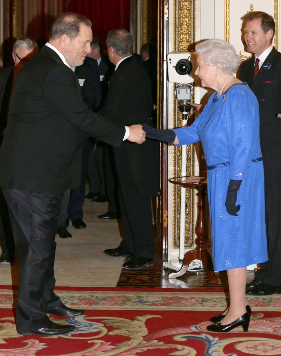 Queen Elizabeth II meets Weinstein during the Dramatic Arts reception at Buckingham Palace on Feb. 17, 2014 in London. (Photo: WPA Pool via Getty Images)