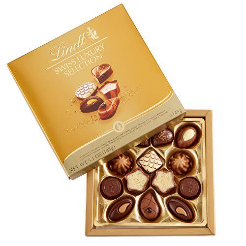 <p><strong>Lindt</strong></p><p>amazon.com</p><p><strong>$16.27</strong></p><p><a href="https://www.amazon.com/dp/B00AEAQJNS?tag=syn-yahoo-20&ascsubtag=%5Bartid%7C10050.g.38204226%5Bsrc%7Cyahoo-us" rel="nofollow noopener" target="_blank" data-ylk="slk:Shop Now" class="link rapid-noclick-resp">Shop Now</a></p><p>You can't go wrong with a box of Lindt chocolates, especially since this 14-piece box of assorted chocolate pralines is very easy on your wallet. </p>