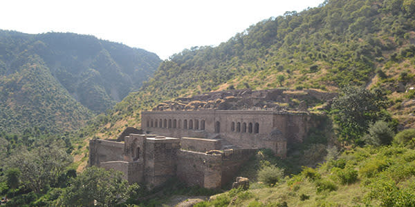 Located 300kms south of Delhi, en route to Jaipur, is Bhangarh Fort. While known for its historical ruins, the village has nationally known as the most haunted place in India. Legend has it that the Hindi deity of Baba Balanath only allowed the construction of Bhangarh under the condition that the city cast no shadows on him. However, when built the palace of Bhangarh was raised to a height that cast a shadow on Baba Balanath’s forbidden retreat causing him to curse Bhangarh for all time. Entry to Bhangarh Fort is prohibited to travelers before sunrise and after sunset which locals says is a rule put in place to protect visitors from ghosts the guard the ruins, including that of Baba Balanath who is said to be buried there.
