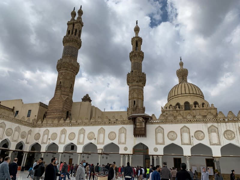 Muslims are seen wearing protective face masks after attending the Friday prayers inside Al-Azhar mosque in the old Islamic area of Cairo