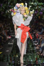 <p><i>Gigi Hadid channeling a bouquet of flowers at the SS18 Moschino show. (Photo: ImaxTree) </i></p>