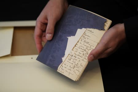 Documents, part of a collection of Franz Kafka papers are displayed during a news conference at the National Library of Israel in Jerusalem