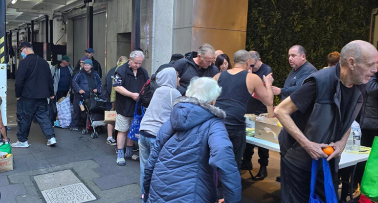 Queues for the SWAG Family Sydney charity in the city's CBD, as demand for food and shelter skyrockets to unprecedented levels. 