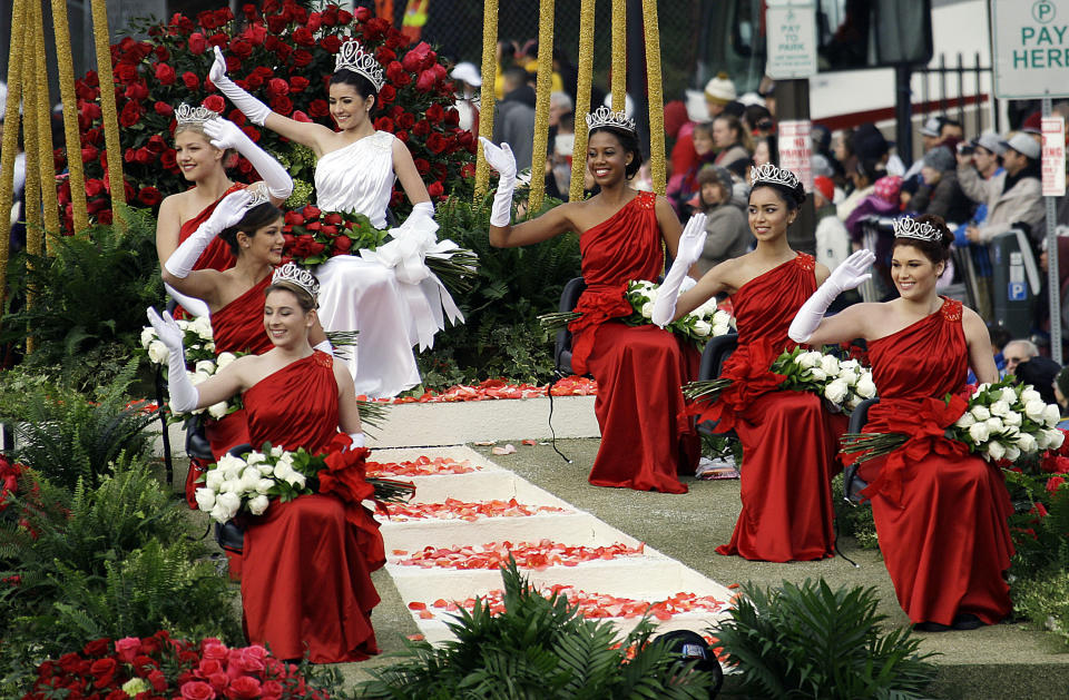 The 2013 Rose Queen and Court are seen in the 124th Rose Parade in Pasadena, Calif., Tuesday, Jan. 1, 2013. Queen Vanessa Manjarrez is at top center, with princesses, clockwise from top right, Nicole Nelam, Sonia Shenoi, Madison Teodo, Victoria MacGregor, Tracy Cuesta and Kate Benuska. (AP Photo/Reed Saxon)