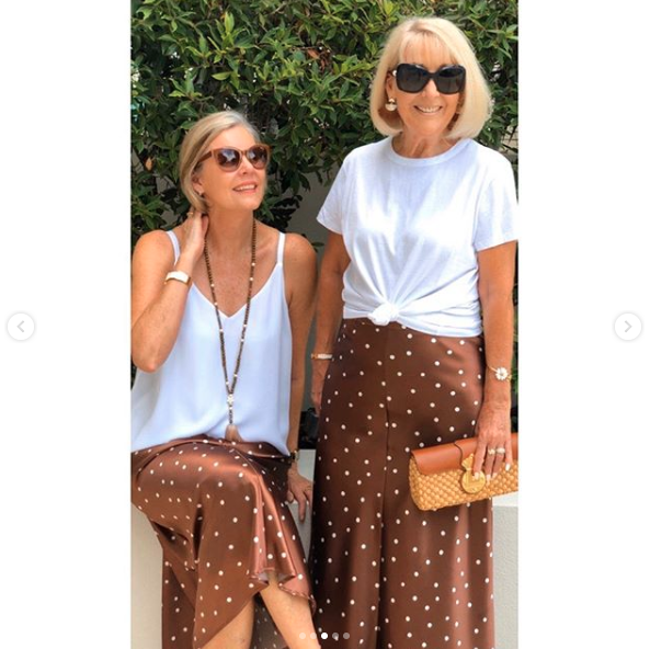 Two older women wear polka dot skirt for casual lunch style
