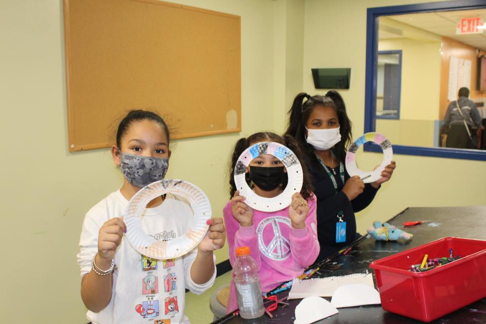 BGCMS pre-teen members show off the beginnings of their dream-catcher creations.