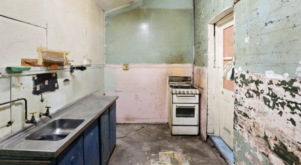 A dilapidated kitchen inside a Waterloo home.