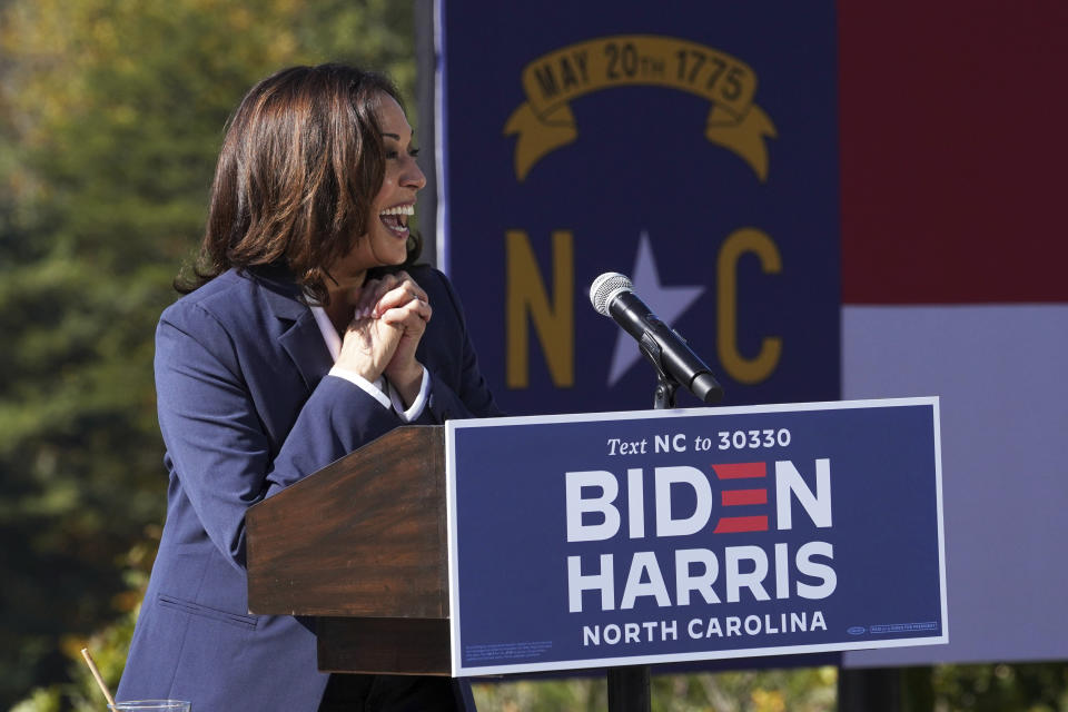 Democratic vice presidential candidate Sen. Kamala Harris, D-Calif., reacts to a group of supporters at UNC-Asheville, Wednesday, Oct. 21, 2020, in Asheville, N.C. (AP Photo/Kathy Kmonicek)