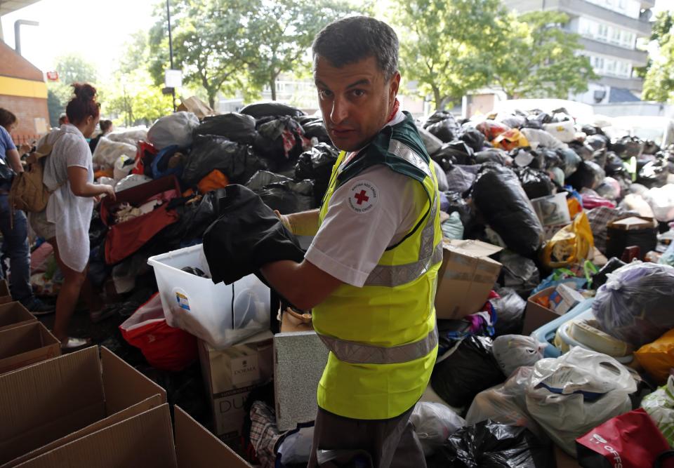 A Red Cross volunteer sorts donations