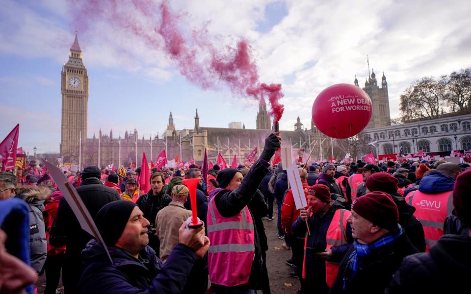 Royal Mail workers gather in Parliament Square - AP Photo/Alberto Pezzali