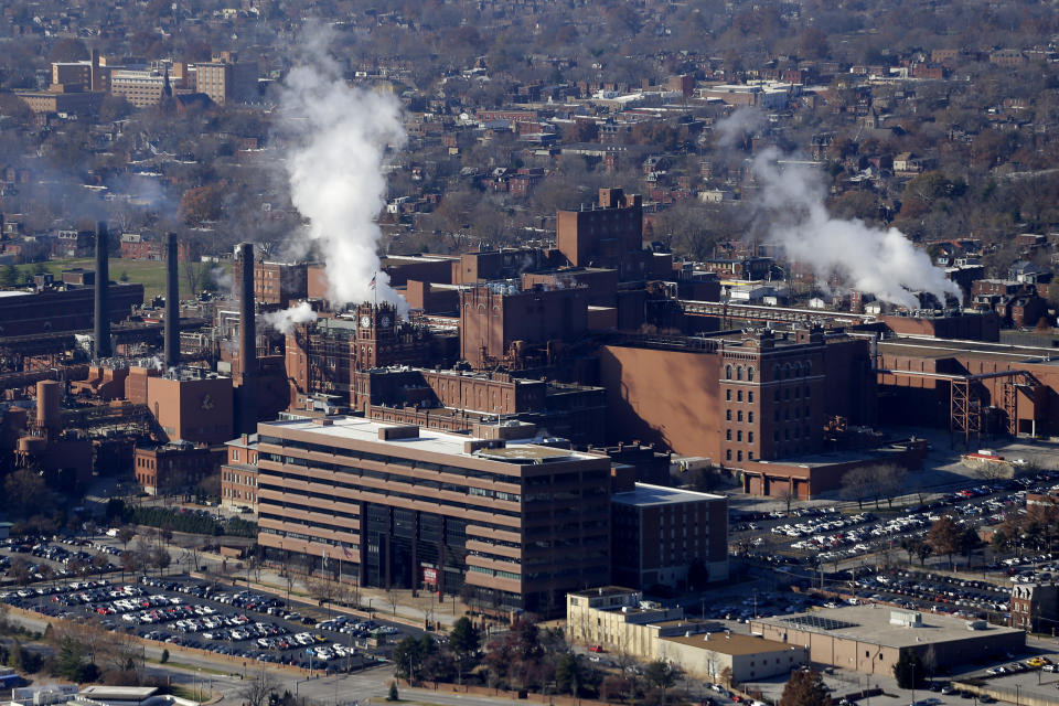 FILE - In this Tuesday, Nov. 25, 2014 file aerial photo, the Anheuser-Busch brewing complex is seen in St. Louis, Mo. A Wisconsin judge on Friday, May 24, 2019, ordered Anheuser-Busch to stop suggesting in advertising that MillerCoors' light beers contain corn syrup, wading into a fight between two beer giants that are losing market share to small independent brewers. (AP Photo/Charlie Riedel, File)