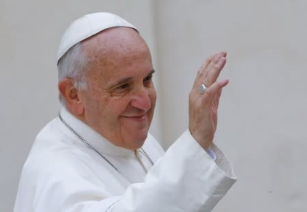 Pope Francis leaves at the end of his weekly general audience in Saint Peter's Square at the Vatican March 16, 2016. REUTERS/Stefano Rellandini