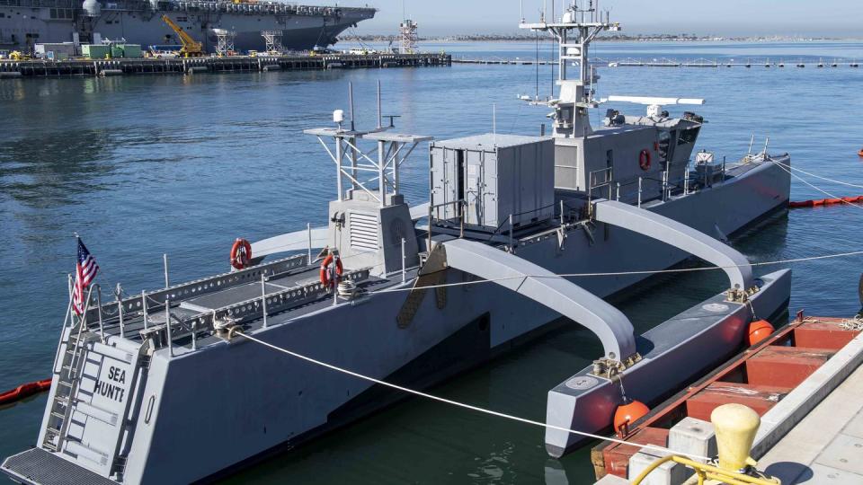 The medium-displacement unmanned surface vessel Sea Hunter sits pierside at Naval Base San Diego in California during a ceremony. (MC2 Kevin C. Leitner/U.S. Navy)