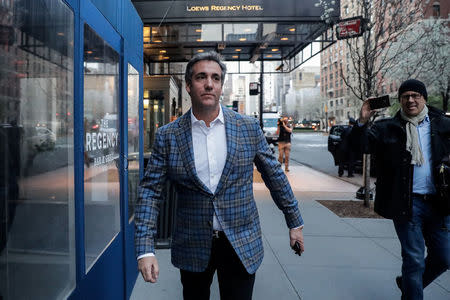 U.S. President Donald Trump's personal lawyer Michael Cohen exits a hotel in New York City, U.S., April 13, 2018. REUTERS/Jeenah Moon