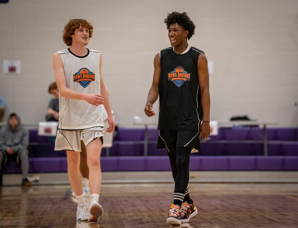 St. Peter's Feree Kent (Right) and Wynford's Cainen Allen (left) share a smile during the 44th News Journal All-Star Classic on Friday night.