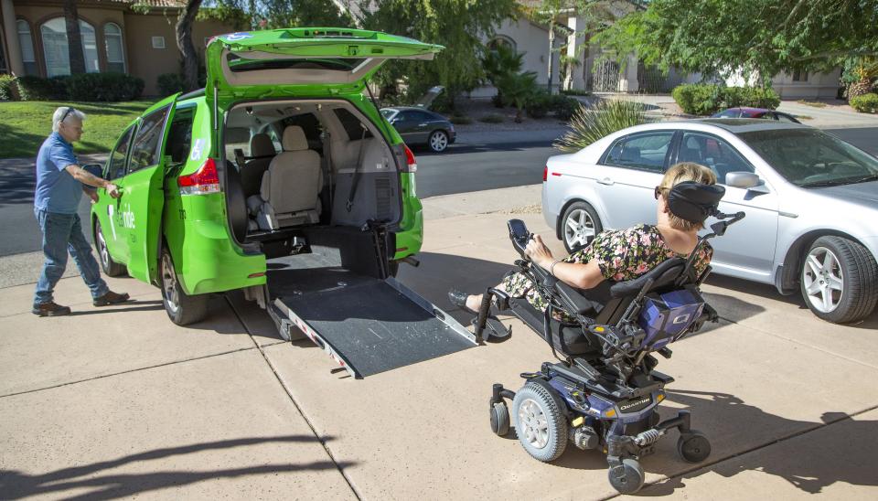 Michelle Murik is physically challenged and used to rely on Dial-A-Ride to get to her job.  Murik, who is wheelchair bound, now has to depend on another service called RideChoice. She prepares to move up the ramp after RideChoice showed up to take her to work, Friday, September 20, 2019.