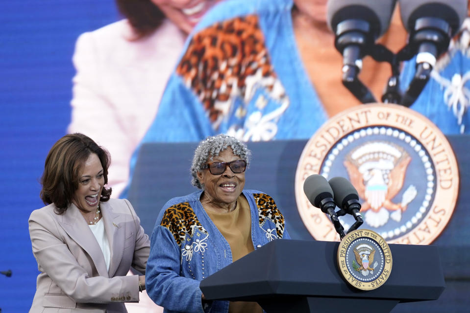 Vice President Kamala Harris welcomes Opal Lee to the stage during a Juneteenth concert on the South Lawn of the White House in Washington, Tuesday, June 13, 2023. Opal Lee is considered the grandmother of Juneteenth. (AP Photo/Susan Walsh)