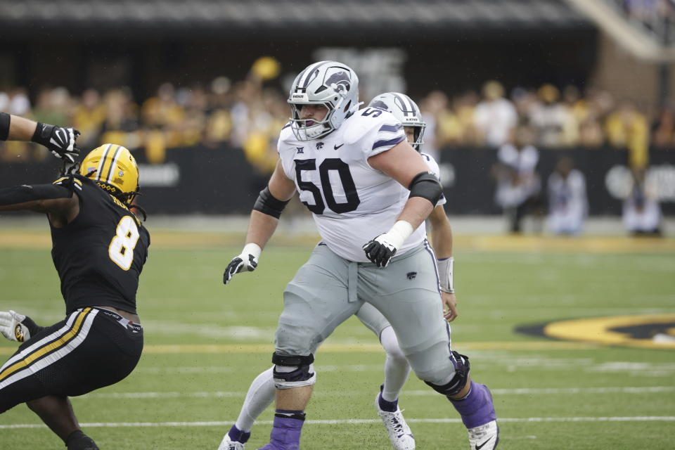 FILE - Kansas State offensive lineman Cooper Beebe (50) plays during an NCAA football game on Saturday, Sept. 16, 2023, in Columbia, Mo. Beebe has been selected to The Associated Press midseason All-America team, Wednesday, Oct. 18, 2023.(AP Photo/Colin E. Braley, File)