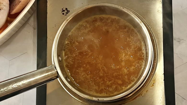 boiling marinade in saucepan