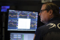 A stock trader works at the New York Stock Exchange, Wednesday, Sept. 18, 2019. The Federal Reserve is expected to announce its benchmark interest rate later in the day. (AP Photo/Mark Lennihan)