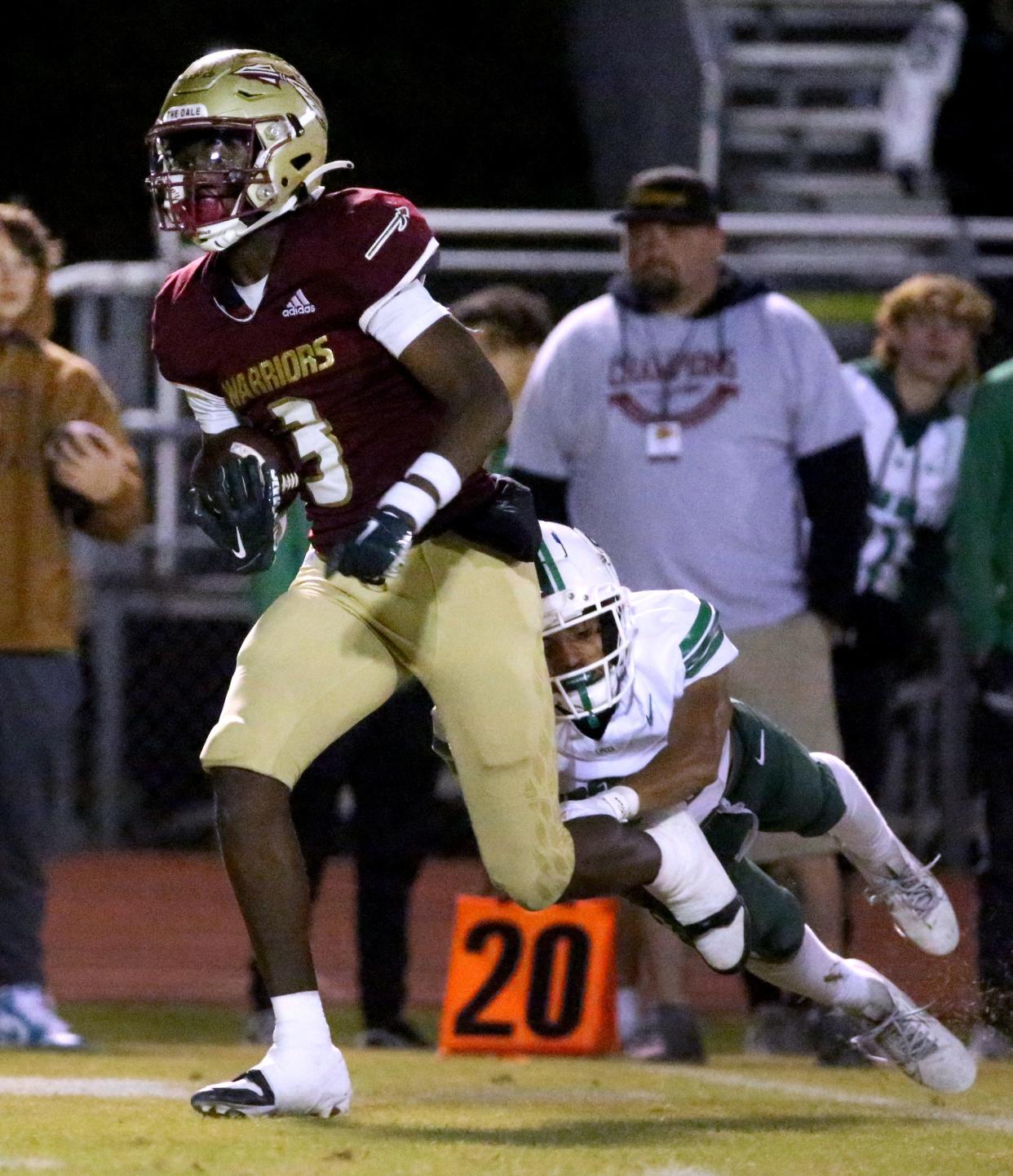 Riverdale's Jaylen Thompson (3) runs the ball in for a touchdown as Green Hill's Robert Shinault (35) tries to stop him during the football playoff game at Riverdale, on Friday, Nov 3, 2023.