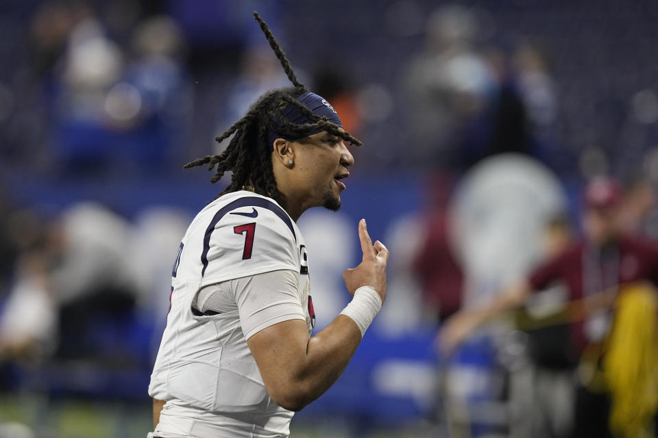 Houston Texans quarterback C.J. Stroud (7) runs off the field after a win over the Indianapolis Colts in an NFL football game Saturday, Jan. 6, 2024, in Indianapolis. (AP Photo/Darron Cummings)