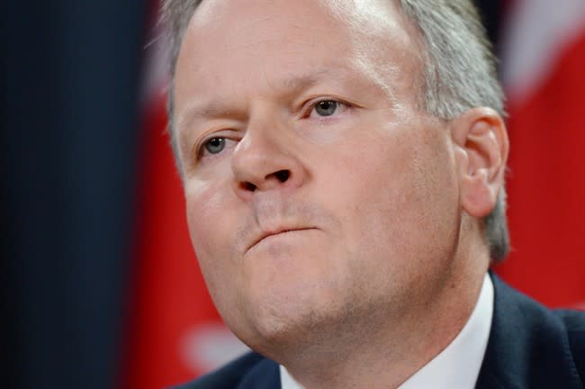 Bank of Canada Governor Stephen Poloz holds a press conference at the National Press Theatre in Ottawa on Oct. 23, 2013. THE CANADIAN PRESS/Sean Kilpatrick