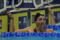 Emma Weyant reacts after winning the Women's 400 Individual Medley during wave 2 of the U.S. Olympic Swim Trials on Sunday, June 13, 2021, in Omaha, Neb. (AP Photo/Jeff Roberson)