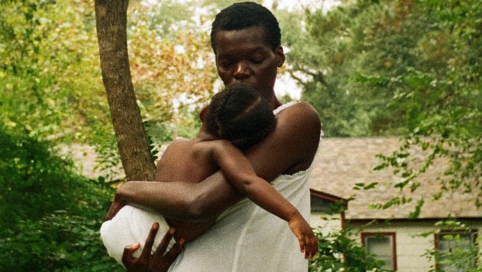 Woman holding baby