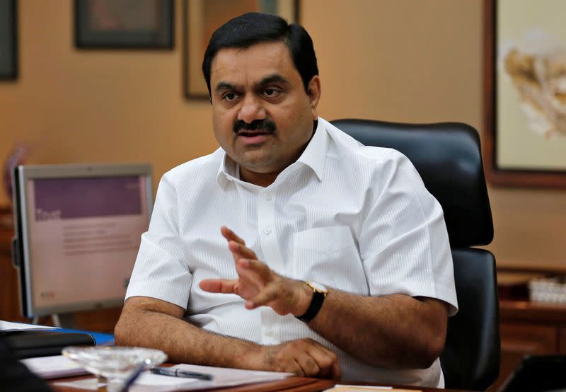 FILE PHOTO: Indian billionaire Adani speaks during an interview with Reuters at his office in Ahmedabad