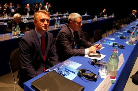 Representatives of the Kosovo Soccer Federation Eroll Salihu (L) and Fadil Vokrri wait to start the 40th Ordinary UEFA Congress in Budapest, Hungary, May 3, 2016. REUTERS/Laszlo Balogh