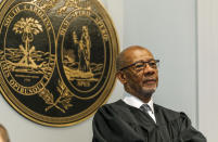 Judge Clifton Newman stands during a break in the Alex Murdaugh's double murder trial at the Colleton County Courthouse in Walterboro, S.C., Friday, Jan. 27, 2023. The 54-year-old attorney is standing trial on two counts of murder in the shootings of his wife and son at their Colleton County home and hunting lodge on June 7, 2021. (Grace Beahm Alford/The Post And Courier via AP, Pool)