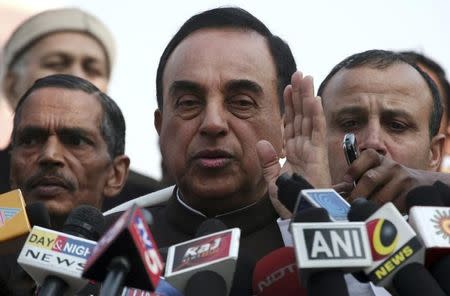 Subramanian Swamy, an opposition politician who brought the petition to revoke the telecom licences issued in 2008, speaks with the media after a verdict outside the Supreme Court in New Delhi February 2, 2012. REUTERS/Parivartan Sharma/Files