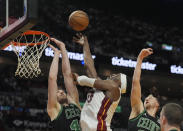 Miami Heat center Bam Adebayo (13) drives to the basket as Boston Celtics center Luke Kornet (40) defends during the second half of Game 4 of an NBA basketball first-round playoff series, Monday, April 29, 2024, in Miami. (AP Photo/Marta Lavandier)