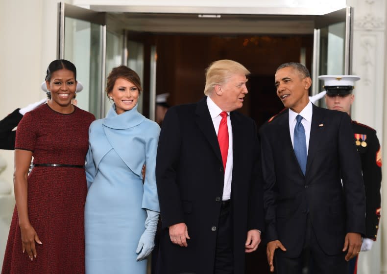 US President Barack Obama(R) and First Lady Michelle Obama(L) welcome Preisdent-elect Donald Trump(2nd-R) and his wife Melania to the White House in Washington, DC January 20, 2017. / AFP / JIM WATSON (Photo credit should read JIM WATSON/AFP via Getty Images)