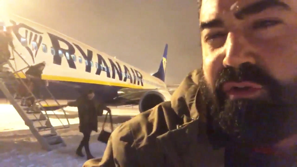 Argimiro Perez after being allowed to disembark from the snowbound flight. (Twitter)