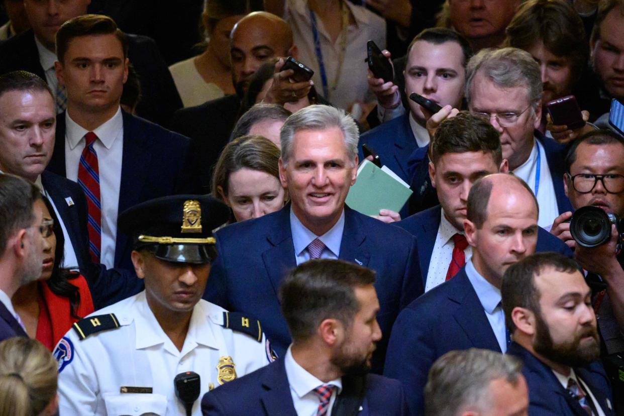 TOPSHOT - US Republican Representative from California Kevin McCarthy walks from the House Chamber after he was ousted as Speaker at the US Capitol in Washington, DC, on October 3, 2023. McCarthy was axed from his role as speaker of the US House of Representatives Tuesday in a ruthless overthrow by far-right Republican lawmakers furious over his cooperation with Democrats. For the first time in its 234-year history, the House backed a resolution "to vacate the office of the speaker" with a 216-210 vote setting the stage for an unprecedented contest to replace McCarthy a year before the presidential election. (Photo by Mandel NGAN / AFP) (Photo by MANDEL NGAN/AFP via Getty Images) ORIG FILE ID: AFP_33XE8E3.jpg