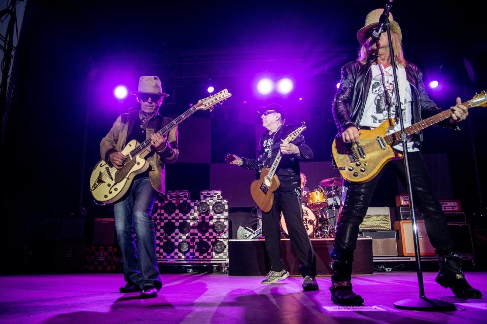 Tom Petersson, from left, Rick Nielsen, and Robin Zander of Cheap Trick perform at the Louder Than Life Festival on Saturday, Oct. 1, 2016, in Louisville, Ky. (Photo by Amy Harris/Invision/AP)
