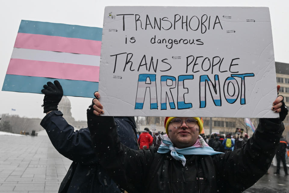 EDMONTON, CANADA - FEBRUARY 11:
Protesters gathered at Violet King Henry Plaza in front of the Alberta Legislature to rally in support of trans youth in Alberta, on February 25, 2024, in Edmonton, Alberta, Canada. (Photo by Artur Widak/NurPhoto via Getty Images)