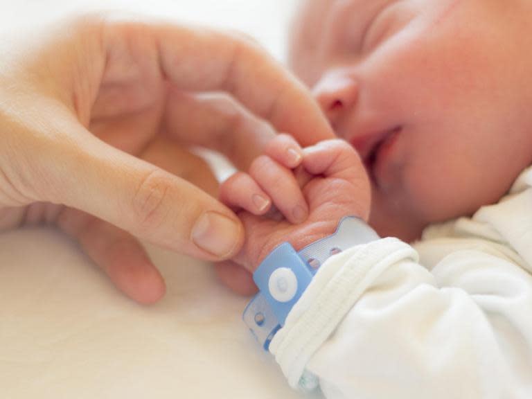 Gently stroking babies reduces pain felt during medical procedures, study suggests