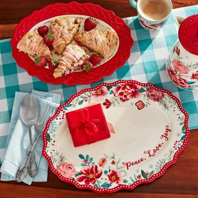 <p><a href="https://go.redirectingat.com?id=74968X1596630&url=https%3A%2F%2Fwww.walmart.com%2Fip%2FThe-Pioneer-Woman-Merry-Meadow-Stoneware-Platter-Set%2F3153497660%3Fathbdg%3DL1103%26from%3D%252Fsearch&sref=https%3A%2F%2F" rel="nofollow noopener" target="_blank" data-ylk="slk:Shop Now;elm:context_link;itc:0;sec:content-canvas" class="link ">Shop Now</a></p><p>The Pioneer Woman Merry Meadow Set of 2 Stoneware Platter Set</p><p>$24.98</p>