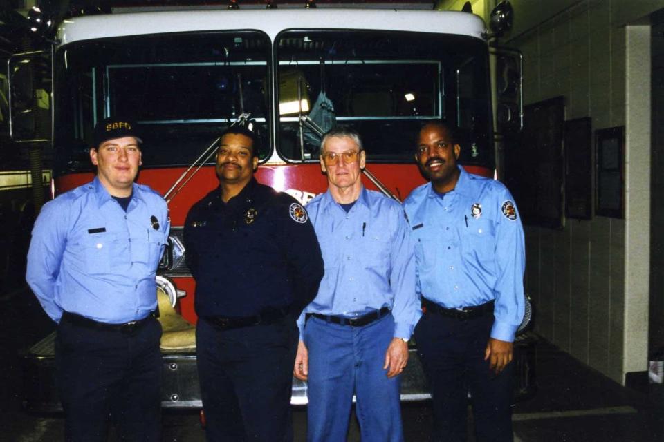South Bend Fire Capt. Tom Adami (left) stands with fellow fire fighters.